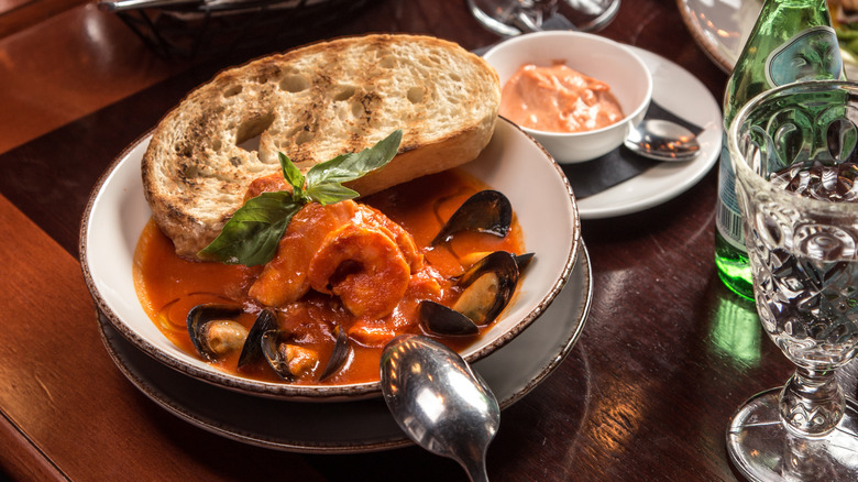 Fish stew with shrimp, mussels, and bread