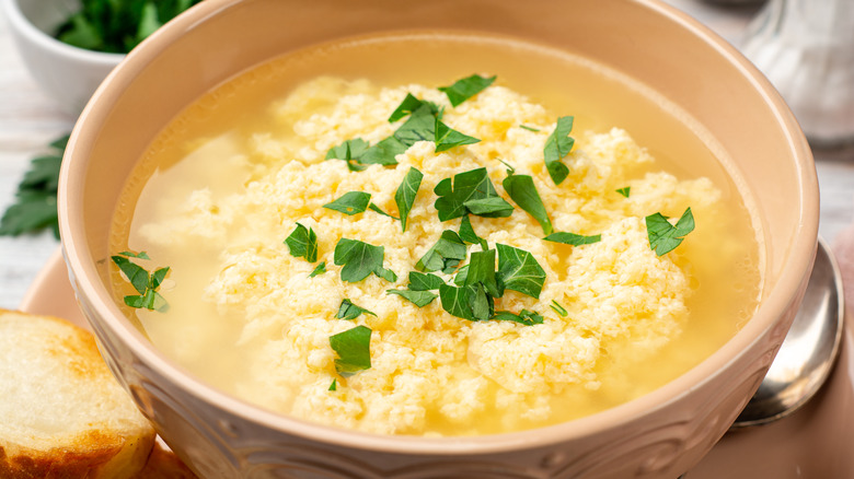 Italian egg drop soup in white dish