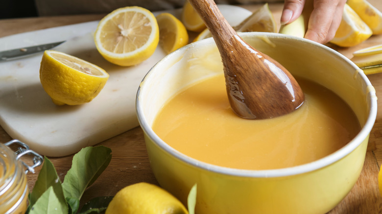 Person making lemon cream