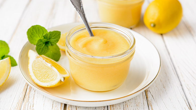 Bowl of lemon cream with a spoon