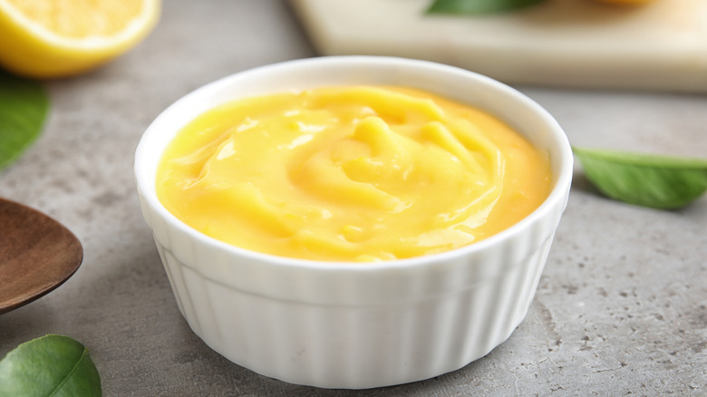 Bowl of lemon cream on a table