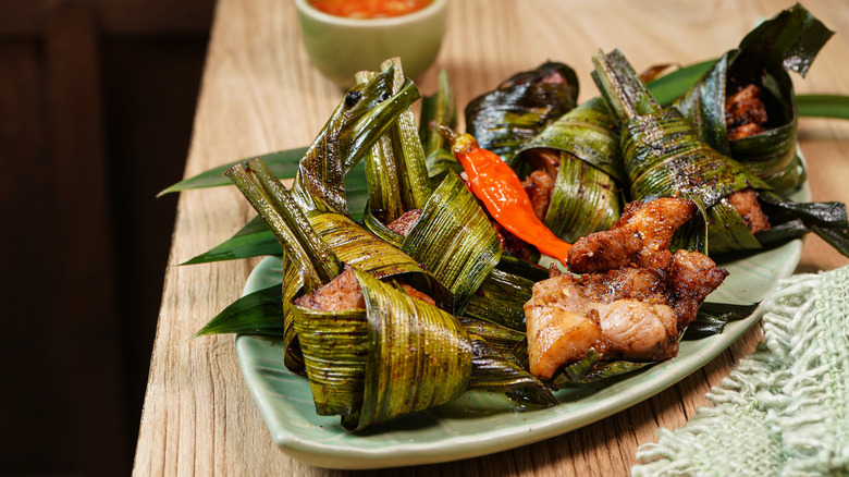 Fried chicken wrapped in pandan leaves