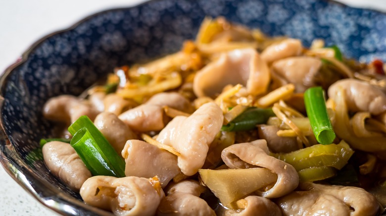 Close-up of boiled pork bung in sauce