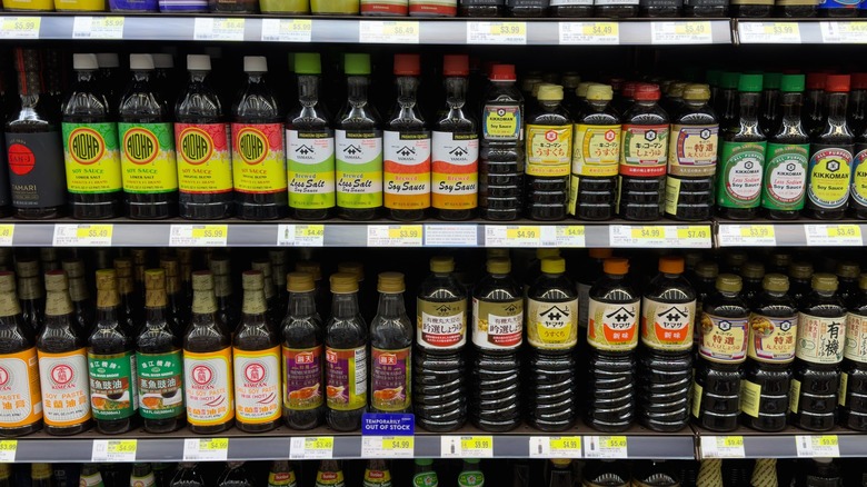 Store shelf filled with soy sauce