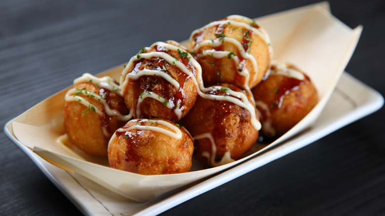 pile of takoyaki on dish