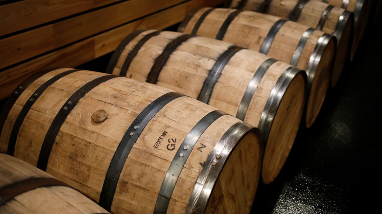 row of bourbon barrels