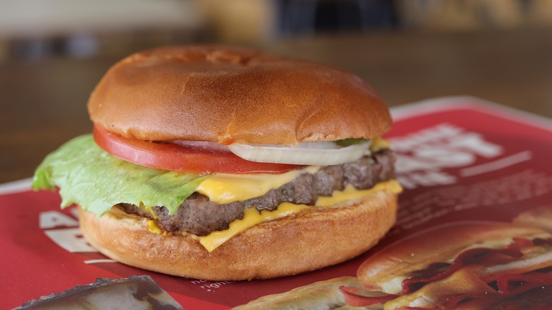 A Wendy's burger on a tray.