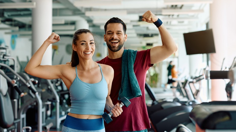 Couple flexing muscles