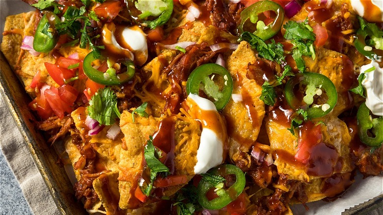 Nachos with pork and jalapenos 