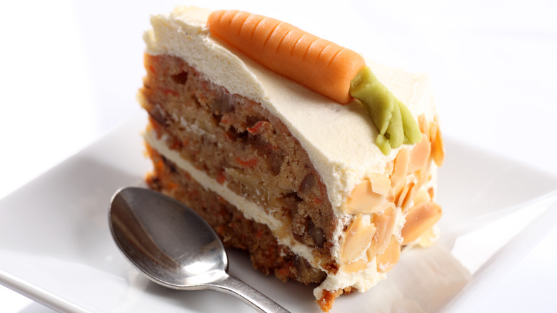 carrot cake slice with decorative sugar carrot topping