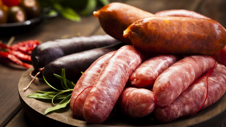 variety of raw sausages