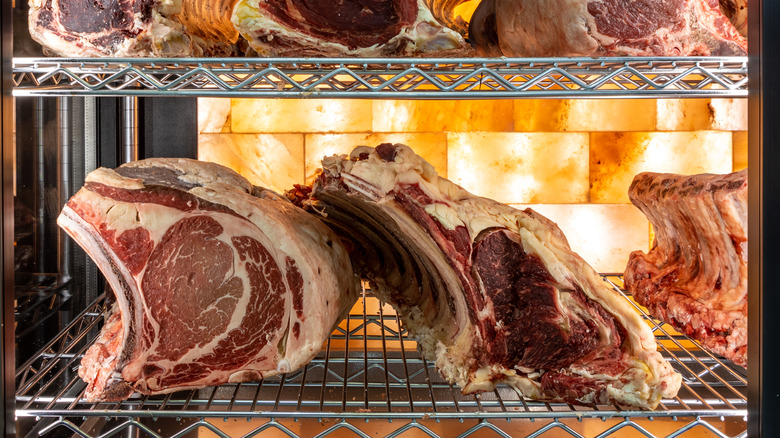 beef drying on metal rack