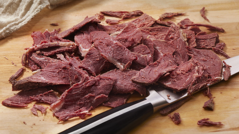 chopped chipped beef with knife