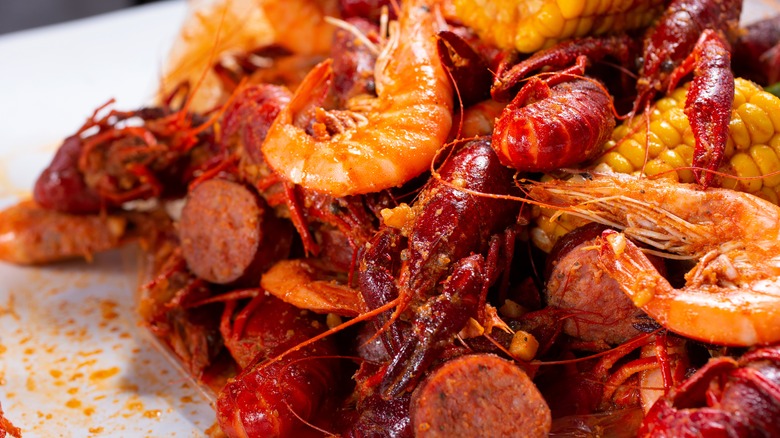 Crawfish boil with corn, shrimp, and sausage