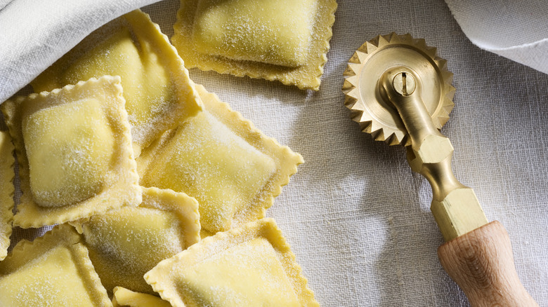 Fresh ravioli and cutter