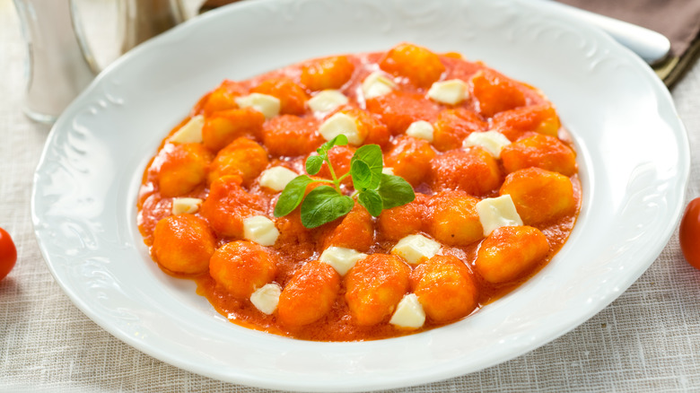 Gnocchi in sauce with cheese