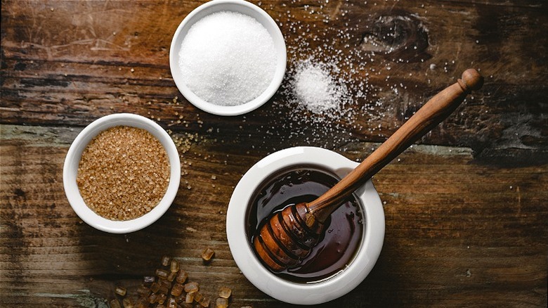 Bowls of sugar and maple syrup