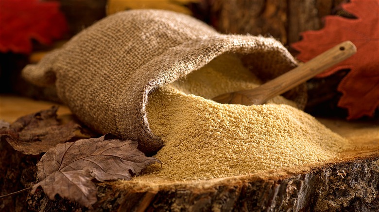 Maple sugar in sack with spoon 