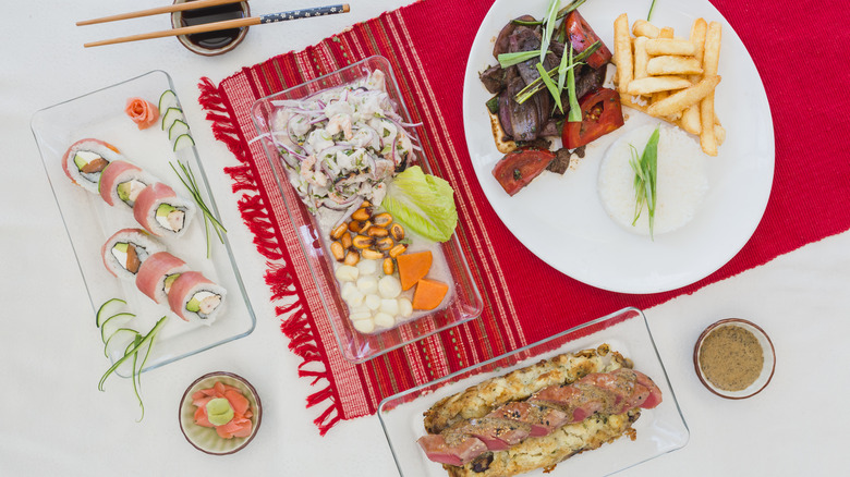 Nikkei food on plates with sauces