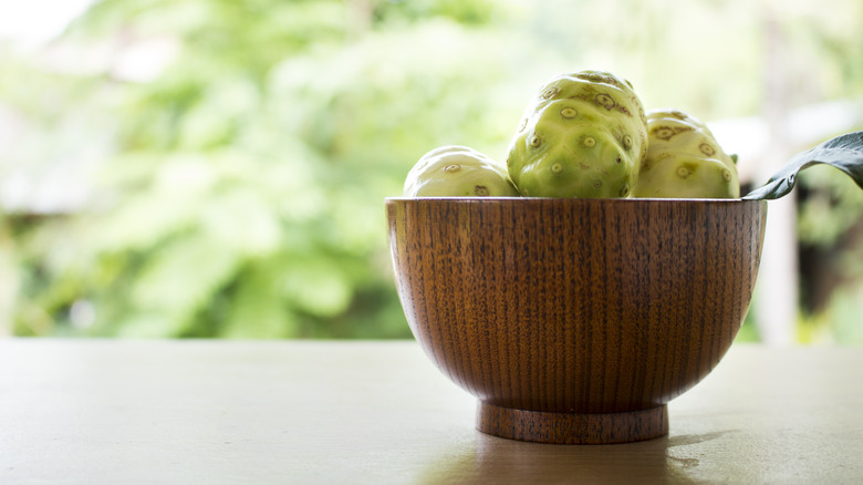 Bowl of noni fruit