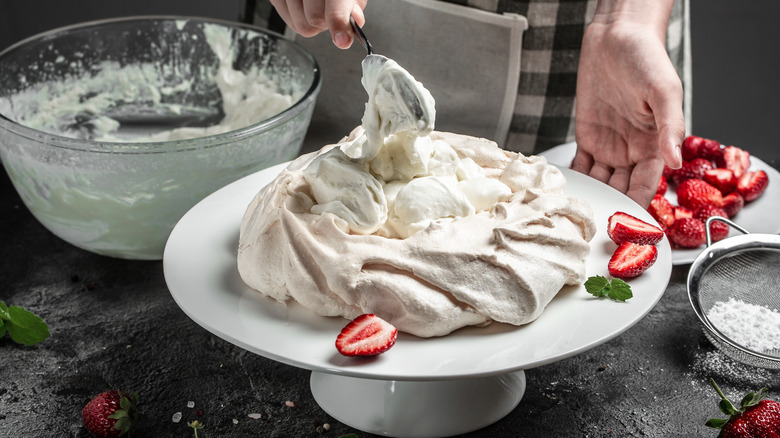 Pavlova being prepared