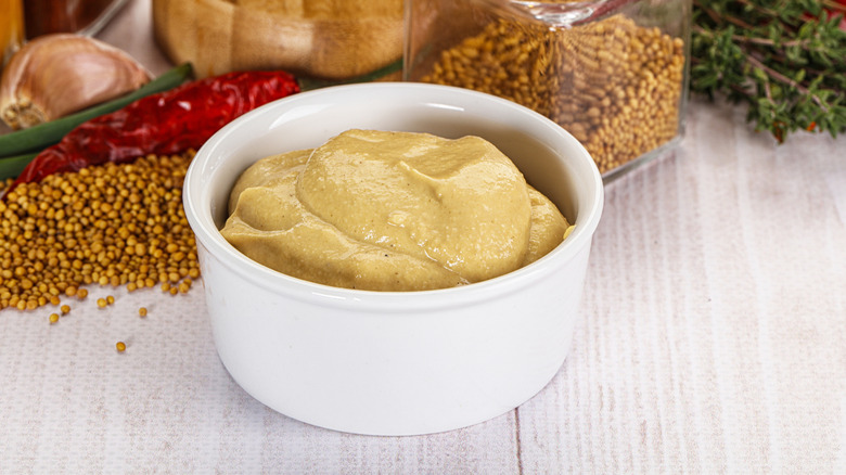 Dijon mustard in white bowl