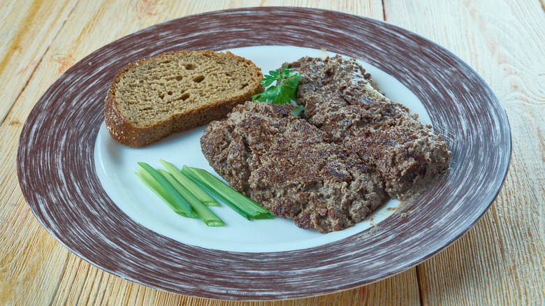 Livemush on plate with bread slice