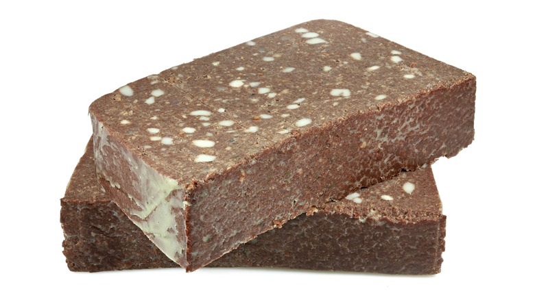 Loaf of scrapple cut in half