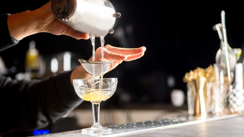 Bartender making cocktail