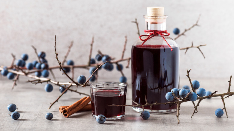 Sloe gin bottle on table