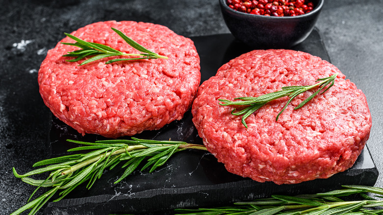 Raw patties with rosemary