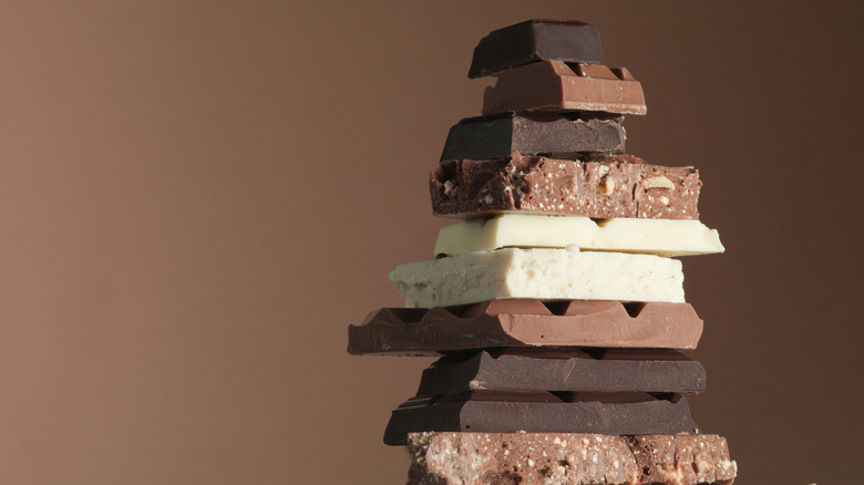 tower of various chocolate bars