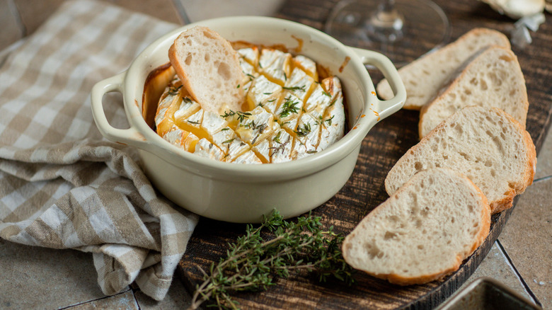 A pot of baked brie and bread