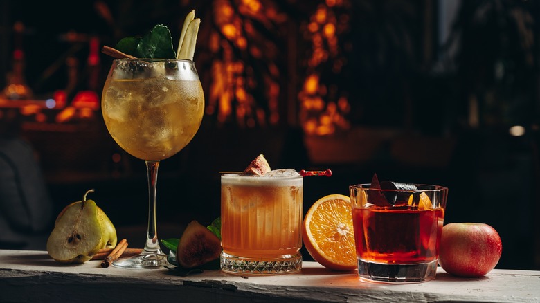 Assorted cocktails on dark background