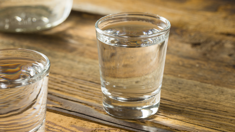 white whiskey shot on table