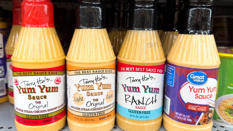 bottles of yum yum sauce on shelf