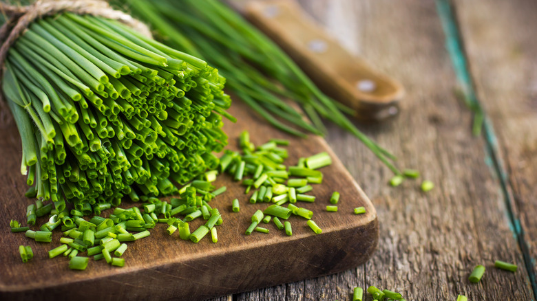 Chives on cutting board