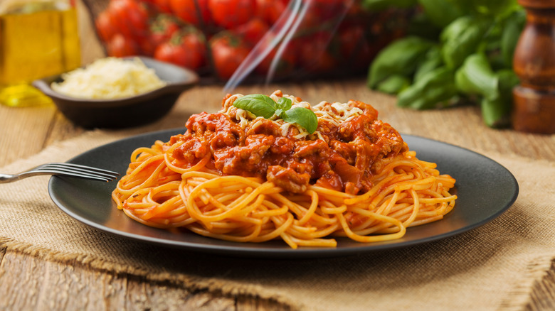 spaghetti on black plate