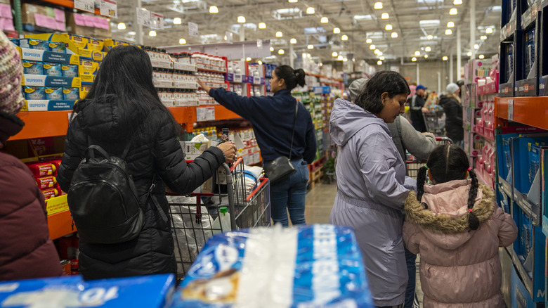 Costco shoppers in the aisle