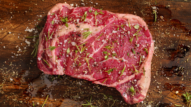 A seasoned ribeye steak