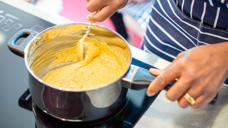 cook making a roux