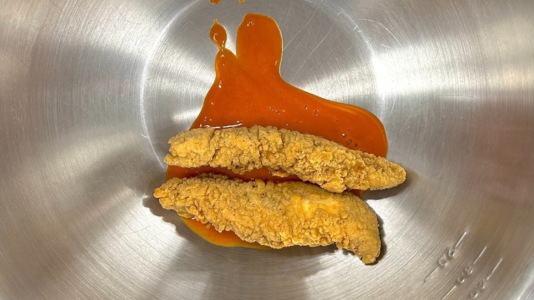 Breaded chicken strips in bowl