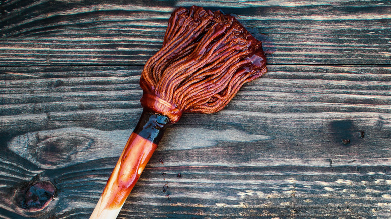 barbecue mop on wooden table