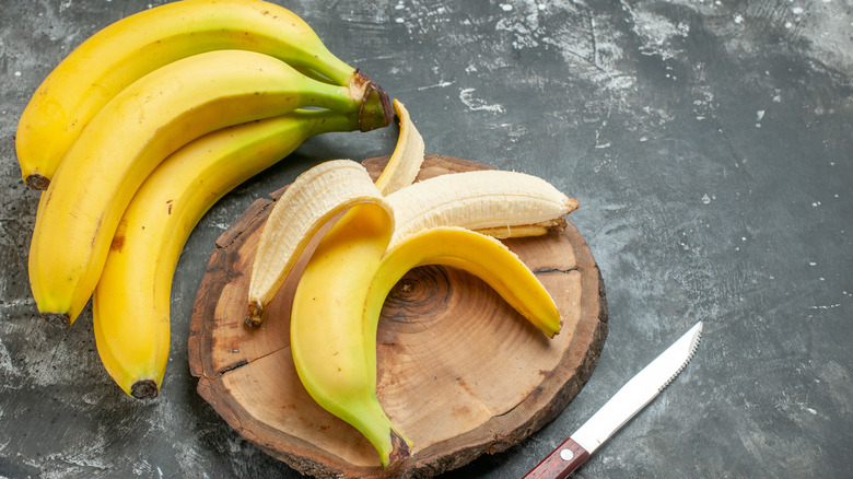 bananas on cutting board