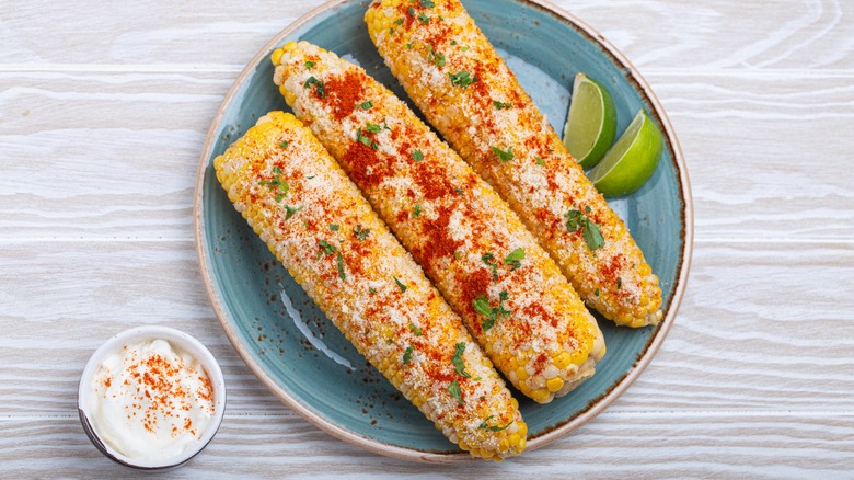 plate of three dressed elote