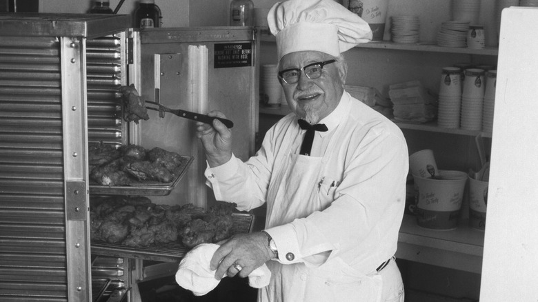 Colonel Sanders cooking fried chicken