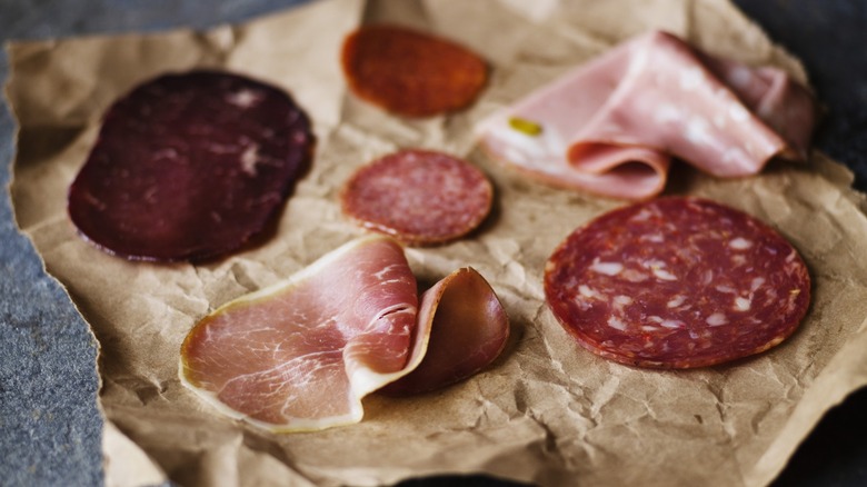 Variety of cured meats on butcher paper 