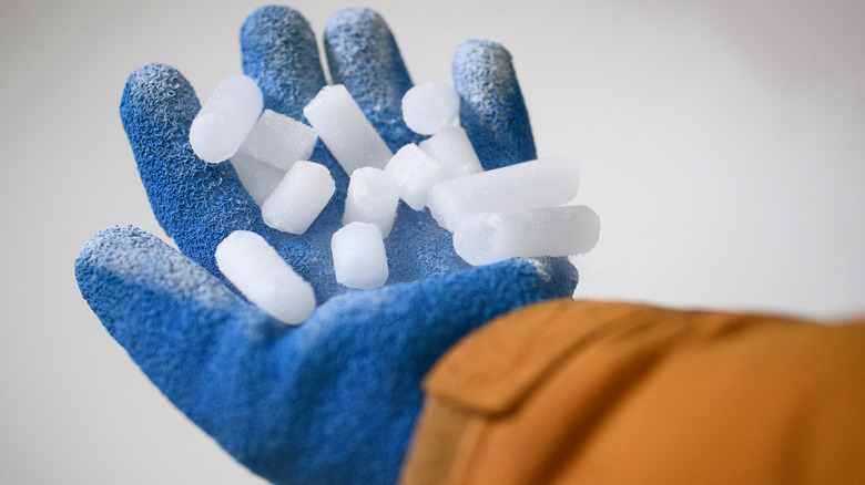 Ice in gloved hand