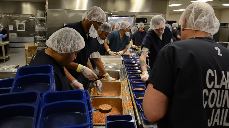 Inmates serving food