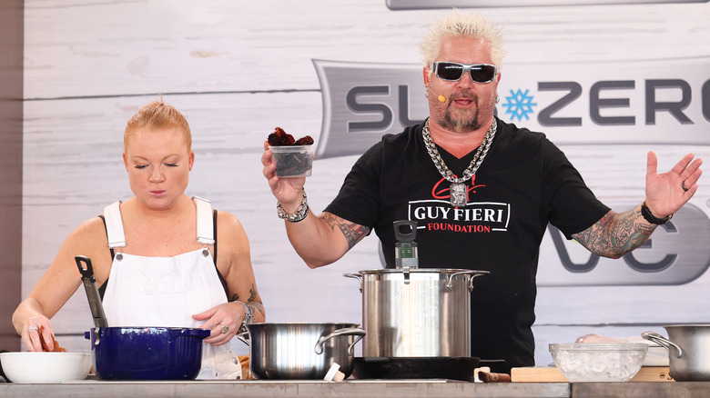 Guy Fieri cooking with Tiffani Faison